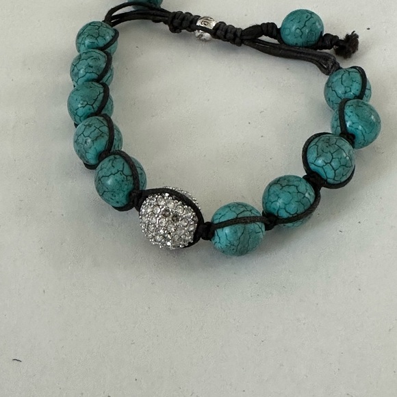 Turquoise beaded bracelet strung with waxed cord with crystal accent bead - Picture 2 of 5